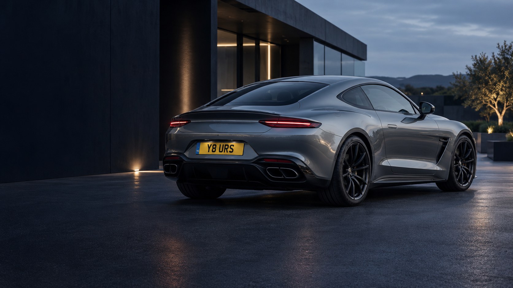 A graphite sports coupe with an illustrative personalised registration